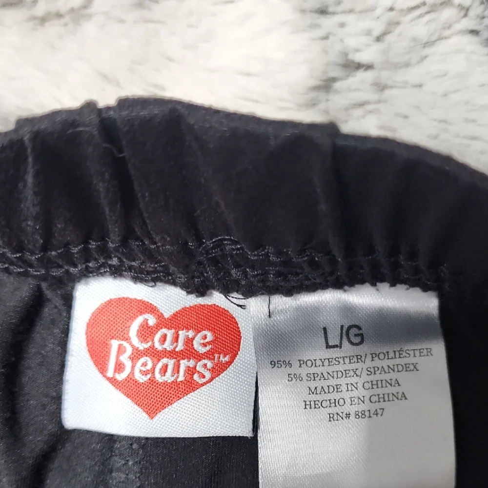 Care Bears Black Shorts with Orange and Purple Print